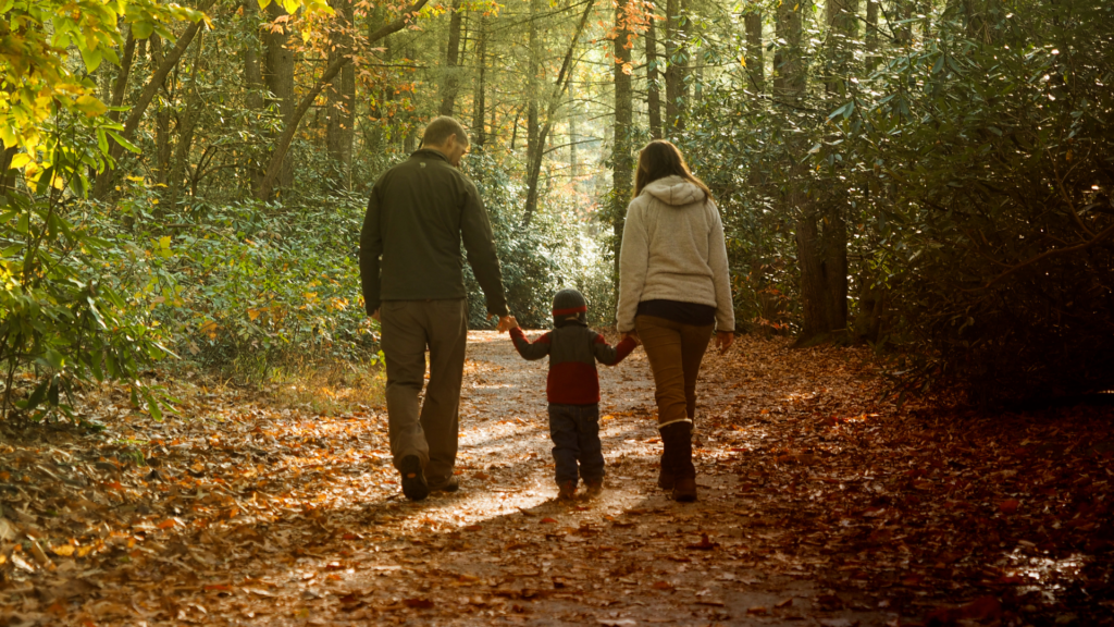 family walking in nature