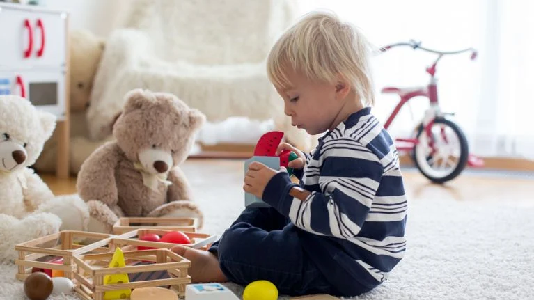Pretend play by a toddler